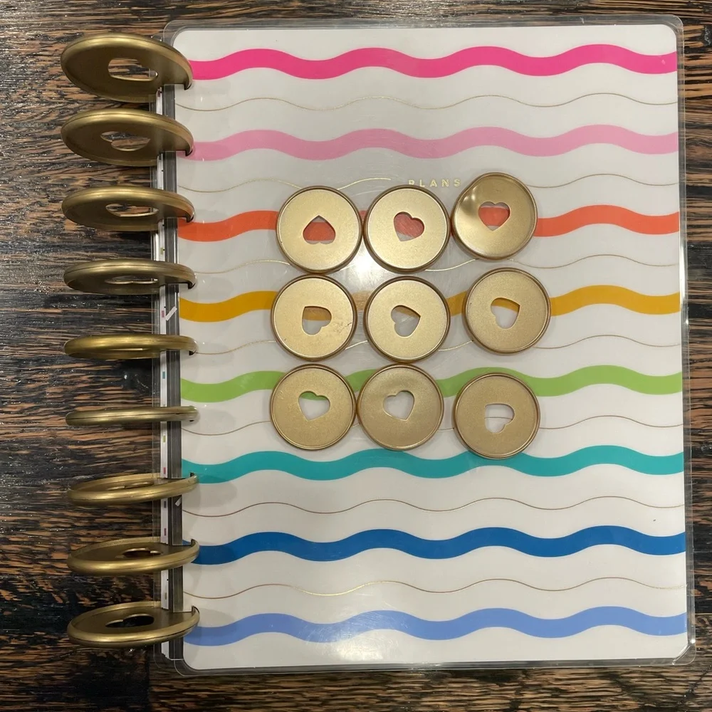 The Happy Planner Colorful Wave Calendar -mix of pages, rings, monthly dividers.